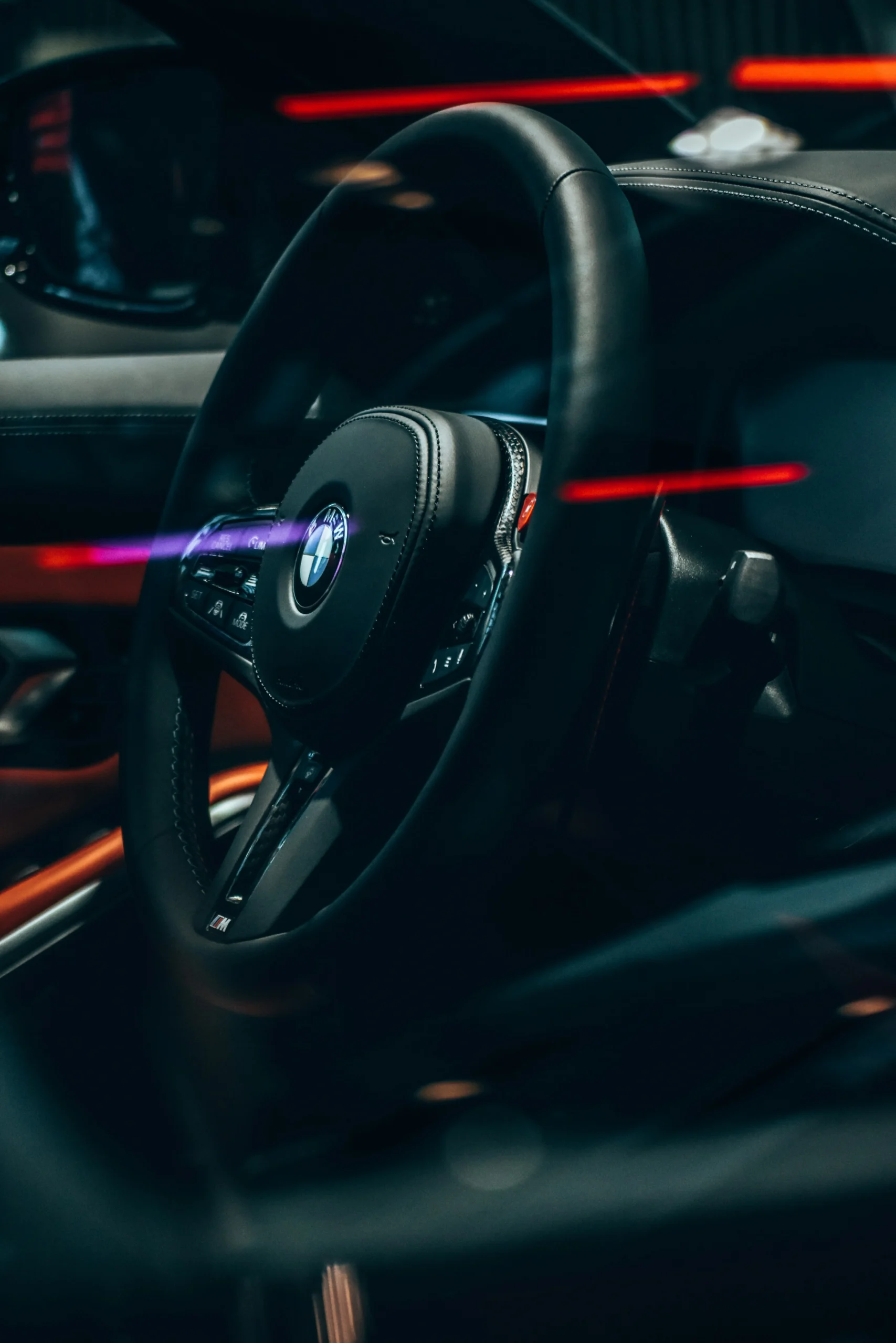 BMW M steering wheel with performance controls and interior lighting
